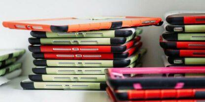 A stack of iPads representing technology tools for teachers.