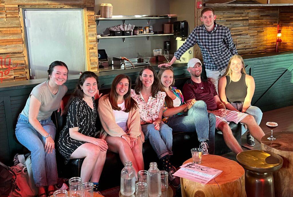 A picture of the eSpark marketing and CX teams enjoying a night of bowling.