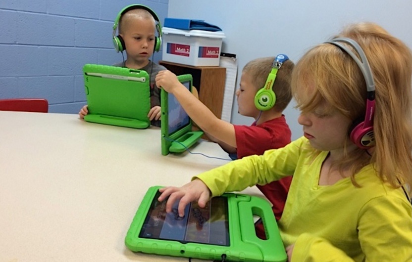 Students using iPads in early education